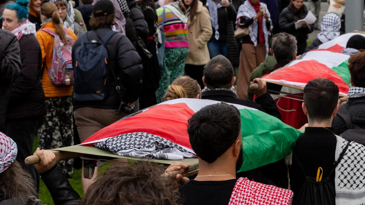 Coffins paraded through Melb, babies’ prams draped in keffiyeh