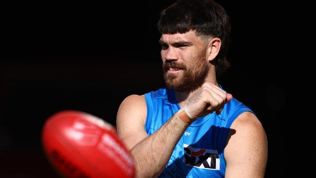 Gold Coast Suns vice-captain Sam Collins has come out and backed Stuart Dew as coach of the Gold Coast Suns. (Photo by Chris Hyde/Getty Images)