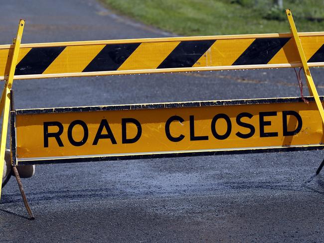 flood damage at Bothwell . Tasmanian Highlands town, picture of the Road closed sign on Logan Road round the back of Bothwell