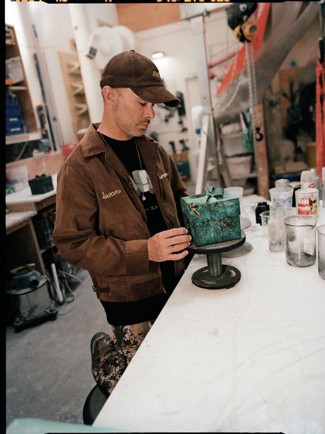 Daniel Arsham at work on the box