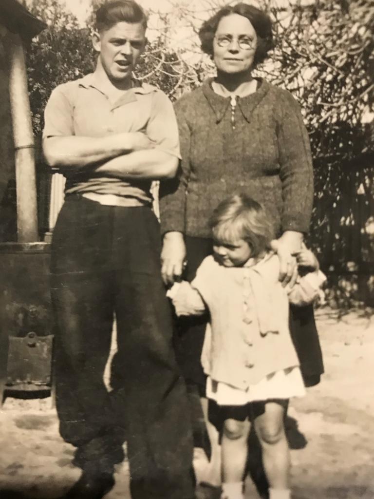 Teenage Syd Kinsman back home in Adelaide before the war, with Mum and one of his little sisters.