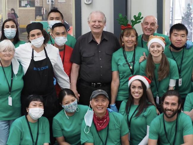 Rev Bill Crews with volunteers feeding thousands of Sydney's homeless at The Exodus Foundation's famous Christmas lunch event.