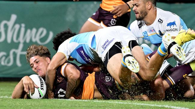 Reece Walsh scores for the Broncos during a strong game for his new club. Picture: Bradley Kanaris/Getty Images