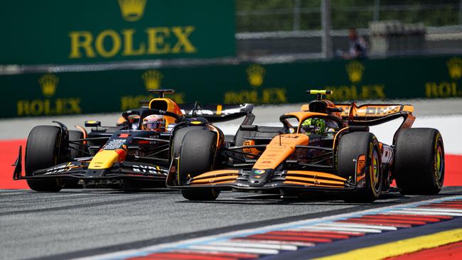 Red Bull Racing's Dutch driver Max Verstappen and McLaren's British driver Lando Norris compete. Photo by Jure Makovec / AFP.