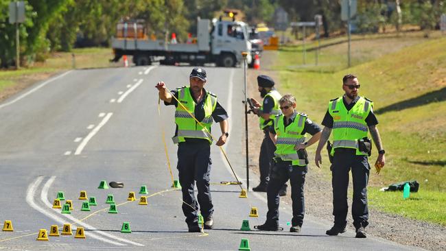 Police investigators at the scene where a boy was hit and killed by a car on Bannockburn Shelford Rd at Teesdale. Picture: Alison Wynd