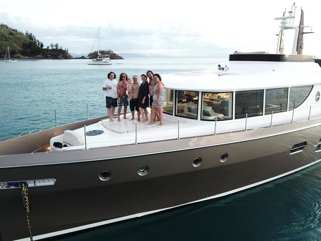 Mark Spillane (third from left) onboard a yacht in the Whitsundays in April 2022. Picture: Supplied