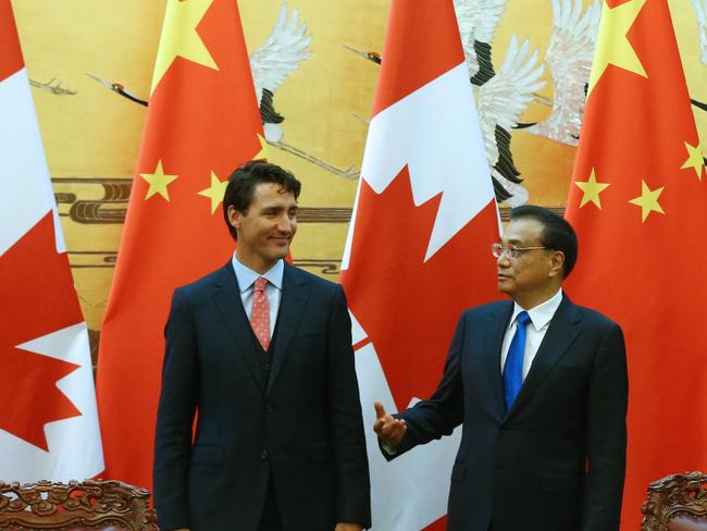 Canadian Prime Minister Justin Trudeau and Chinese Premier Li Keqiang at the Great Hall of the People in Beijing. Picture: Wu Hong/Getty Images