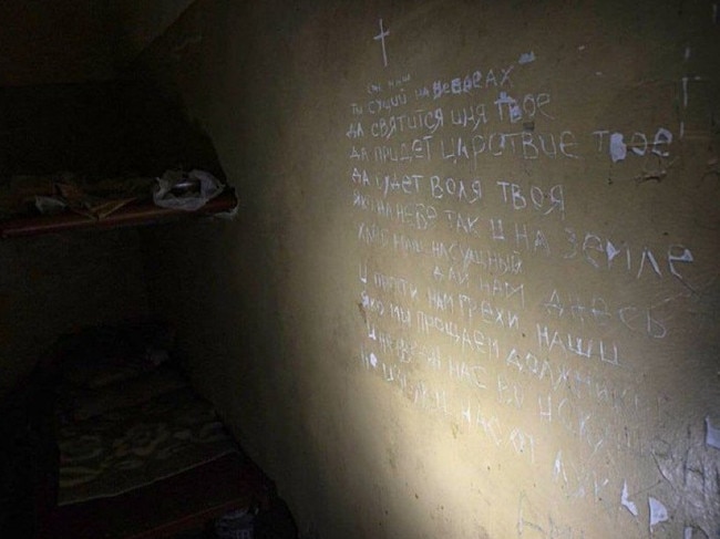 The Lord’s Prayer was carved on the wall by Ukrainian prisoners. Picture: Defence of Ukraine/Twitter