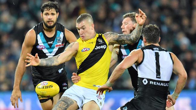 Dustin Martin kicks Richmond forward against Port Adelaide at Adelaide Oval. Picture: David Mariuz (AAP)