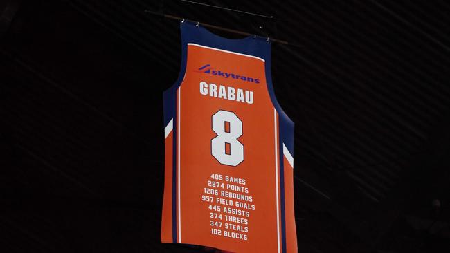 Cairns Taipans Legend Aaron Grabau was feted on his retirement after playing 405 games for the club before the Round 12 NBL match between the Cairns Taipans and the Adelaide 36ers at the Cairns Convention Centre in Cairns, Sunday, December 22, 2019. (AAP Image/Brian Cassey).