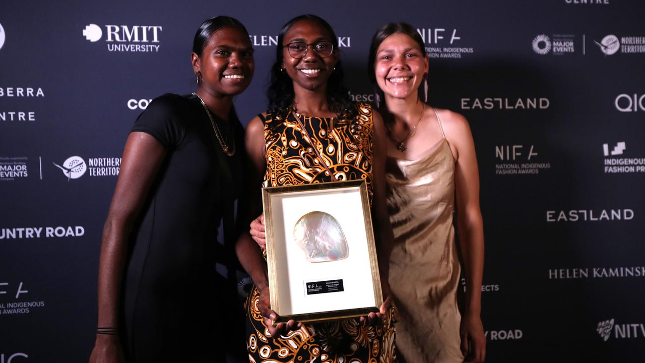 Walmajarri, Gooniyandi model Kahlia Rogers, centre, was named the inaugural Cecilia Cubillo Young Achiever Award winner at the 2024 National Indigenous Fashion Awards on Larrakia Country, Darwin. Picture: Zizi Averill