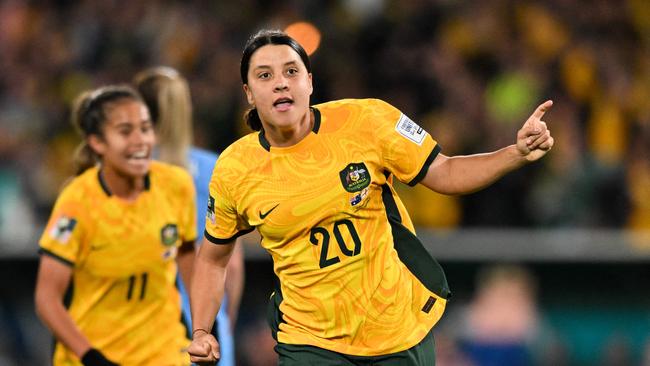 Sam Kerr celebrating scoring her team's first goal during the Australia and New Zealand 2023 Women's World Cup semi-final.