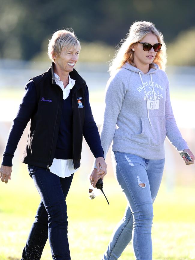 Cancer survivor and horse trainer Gillian Heinrich walking with daughter Tayla Heinrich in 2015. Picture: Richard Gosling