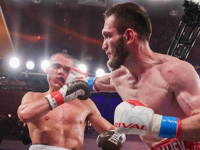 ORLANDO, FLORIDA - OCTOBER 19: Bakhram Murtazaliev punches Tim Tszyu at Caribe Royale Orlando on October 19, 2024 in Orlando, Florida.   Alex Menendez/Getty Images/AFP (Photo by Alex Menendez / GETTY IMAGES NORTH AMERICA / Getty Images via AFP)