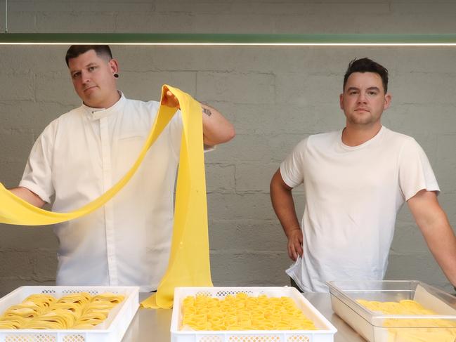 Gus Cadden and Alex Ghaddab prepare some pasta at their new Italian restaurant Osteria Renata. Picture: Ian Currie