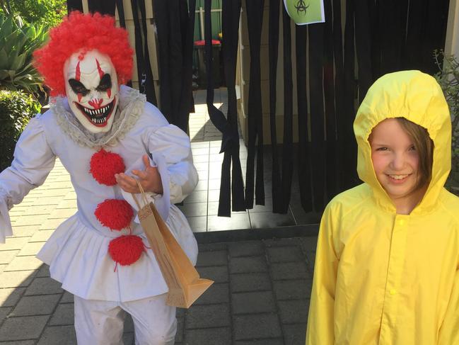 Dress-up fans Max, 13, as Pennywise and Cadence, 9, as Georgie recreate characters from the move It.