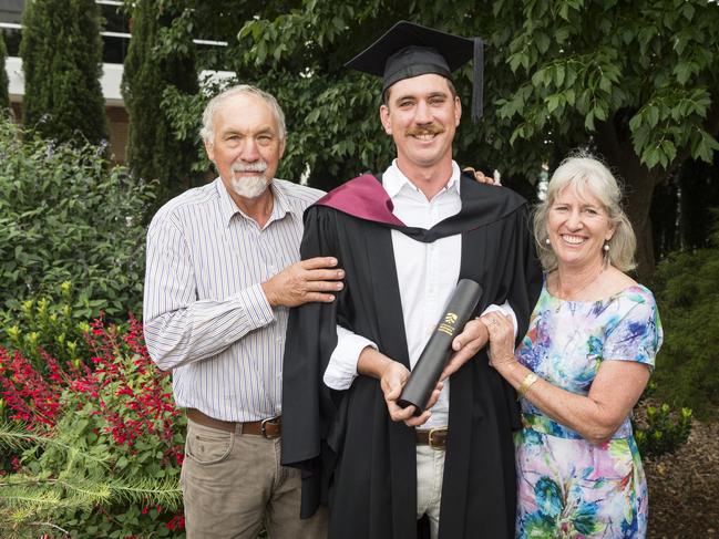 Bachelor of Engineering Science graduate Daniel Grebenshikoff with parents Steve and Mary Grebenshikoff at a UniSQ graduation ceremony at Empire Theatres, Tuesday, February 13, 2024. Picture: Kevin Farmer