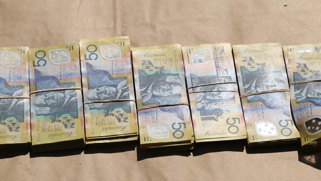 More than $210,000 cash was seized as part of the Strike Force Raptor investigation.