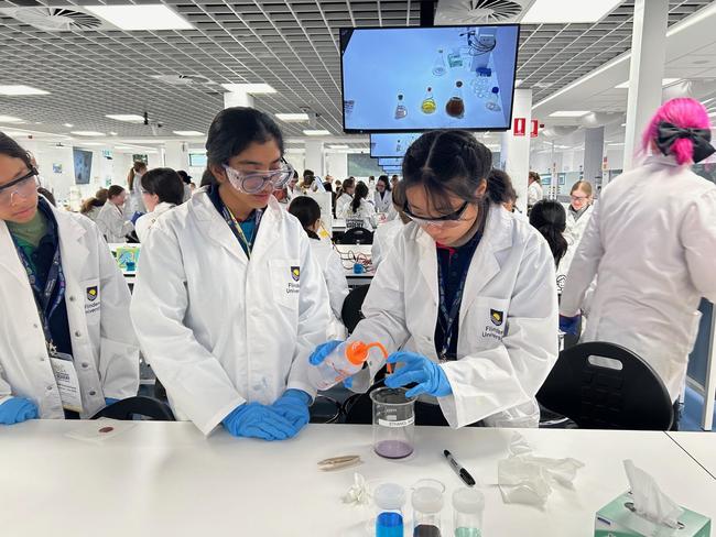 Darwin Middle School students Saibreena Khan, Grishma Desai and Renee Li at the Flinders University STEM academy.