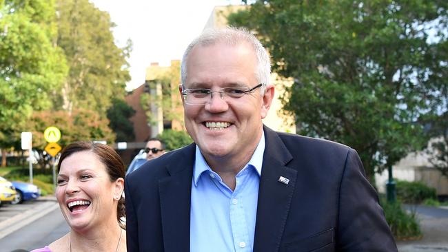 Prime Minister Scott Morrison and wife Jenny speak to the media as they arrive at the Horizon Church in Sutherland in Sydney, Sunday, 19 May, 2019. Approximately 16.5 million Australians have voted the 2019 Election with the Liberal Party retaining Government, with 59.2 per cent of the vote counted, the Coalition appears to have won 74 seats to LaborÃ•s 66 seats.  (AAP Image/Joel Carrett) NO ARCHIVING