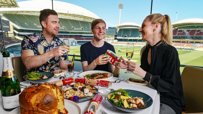 Ethan, Lochie and Jo sample the Christmas Day lunch at Five Regions restaurant at the Oval Hotel. Picture: Brenton Edwards