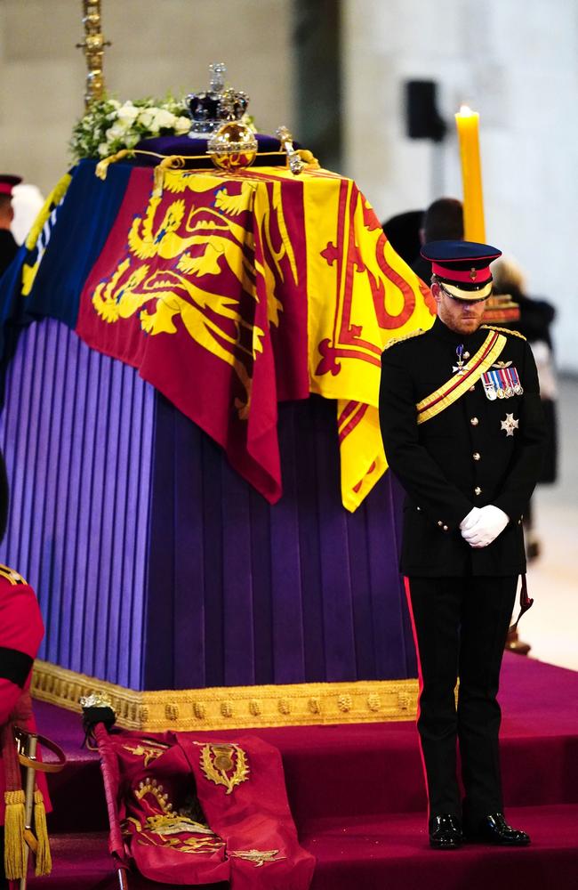 Prince Harry, Duke of Sussex holds a vigil beside the coffin of his grandmother. Picture: Getty Images