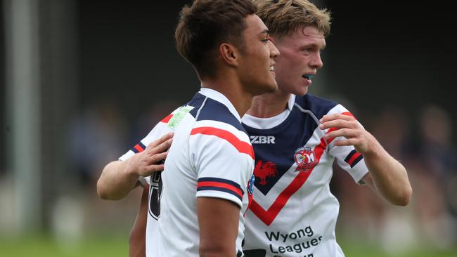 Samisoni Talakai and Sam Gillespie celebrate a try for the Central Coast Roosters against the Monaro Colts in round one of the Laurie Daley Cup. Picture: Sue Graham