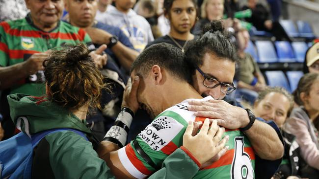 An emotional Cody Walker with family and friends after the Rabbitohs win.