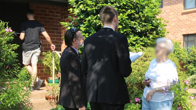 Police talk to a resident at the nursing home this week. Picture: NSW Police