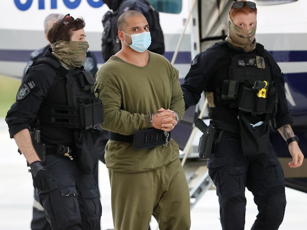 Alleged drug kingpin Mostafa Baluch was escorted back to Sydney under police guard. Picture: Richard Dobson.