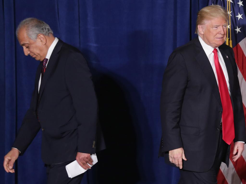 Donald Trump takes the stage after being introduced by former US Ambassador to Iraq and Afghanistan, Zalmay Khalilzad. Picture: AFP