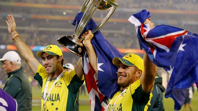 Glenn Maxwell and Aaron Finch with the World Cup trophy in 2015. Picture: Wayne Ludbey