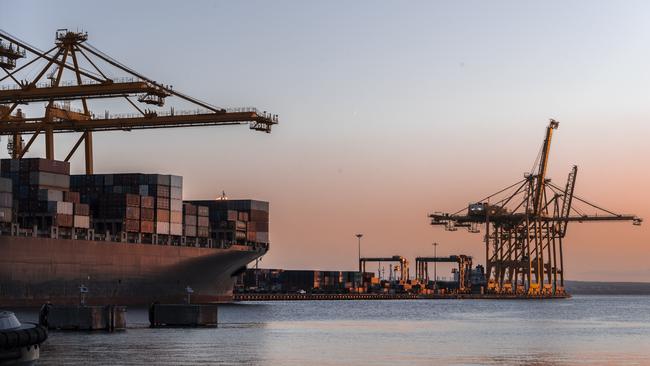 At least 40 container ships are waiting to unload off the coast of NSW. Picture: Monique Harmer