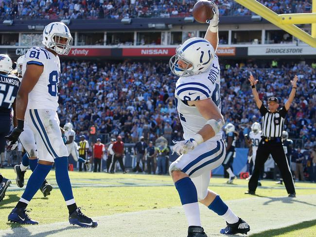 Devin Street #81 watches as teammate Jack Doyle #84 of the Indianapolis Colts spikes the ball.