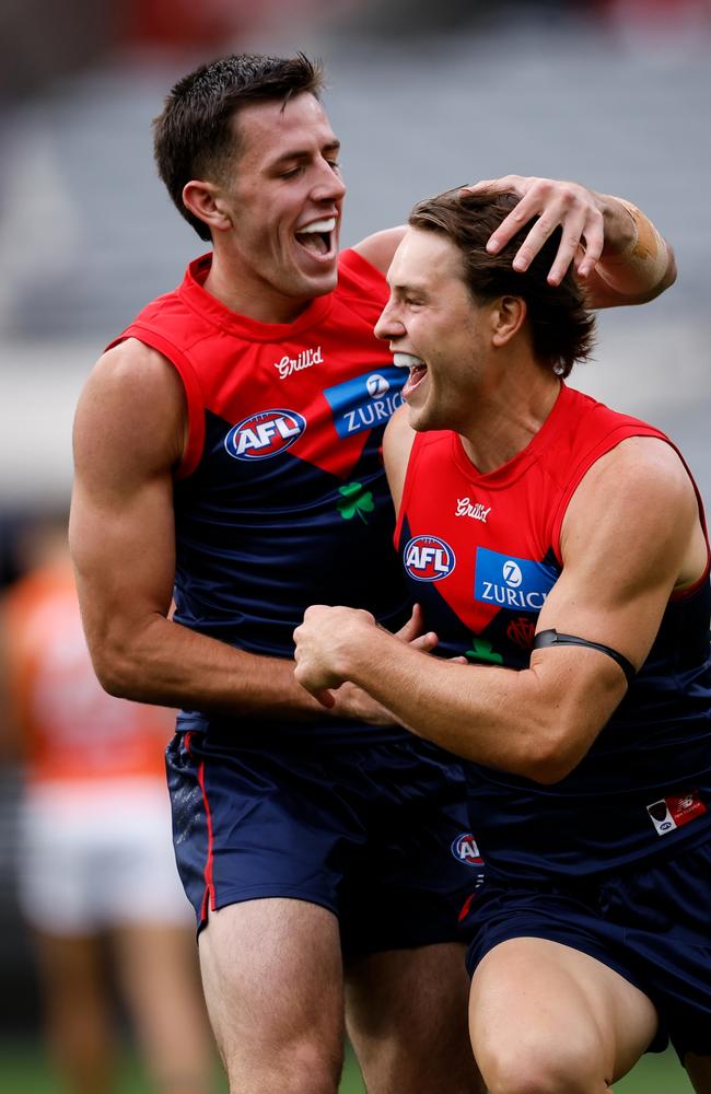 Tom Sparrow and Xavier Lindsay celebrate a goal. Picture: Dylan Burns/AFL Photos via Getty Images.