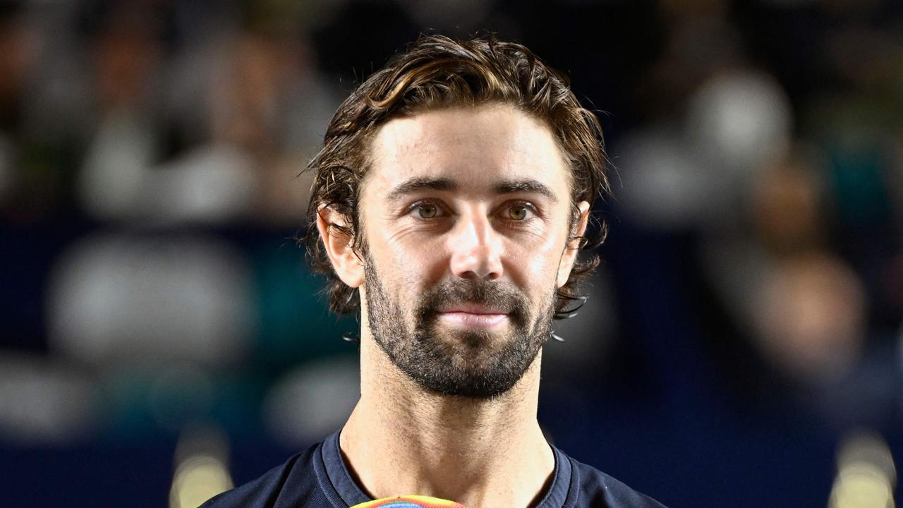 Australia's Jordan Thompson hold his trophy after winnings against Norway's Casper Ruud in the men's singles final of the ATP 250 Mexico Open tennis event at the Cabo Sports Complex in Los Cabos, Mexico on February 24, 2024. (Photo by ALFREDO ESTRELLA / AFP)