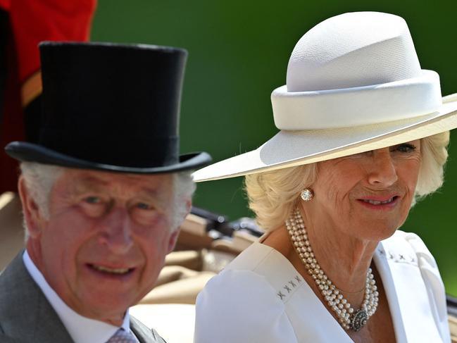 Prince Charles and Camilla, Duchess of Cornwall arrive in a horse-drawn carriage to attend the second day of Royal Ascot. Picture: AFP