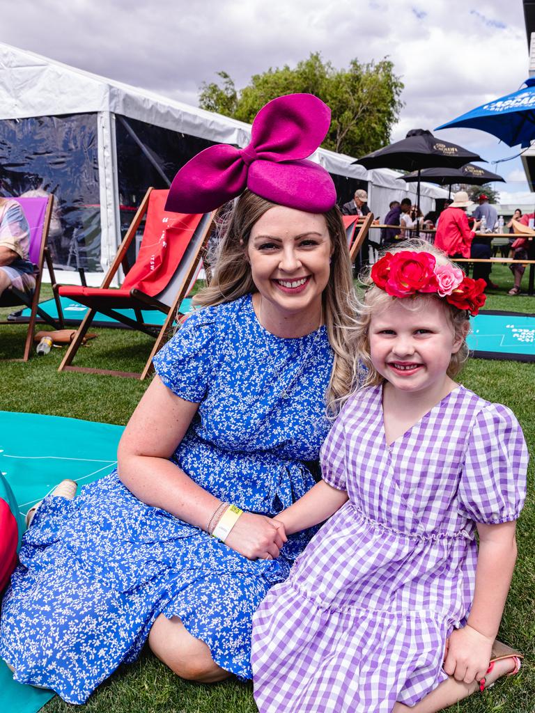 Stephanie and Elouise Jones, aged 5 are enjoying the Hobart Cup Race Day at Elwick Racecourse. Picture: Linda Higginson