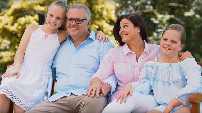 Scott Morrison with his wife Jenny, and daughters Lily, left, and Abbey, right as seen in the PM’s family story video.