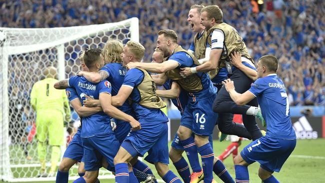Iceland players celebrate a goal by Iceland's Arnor Ingvi Traustason.