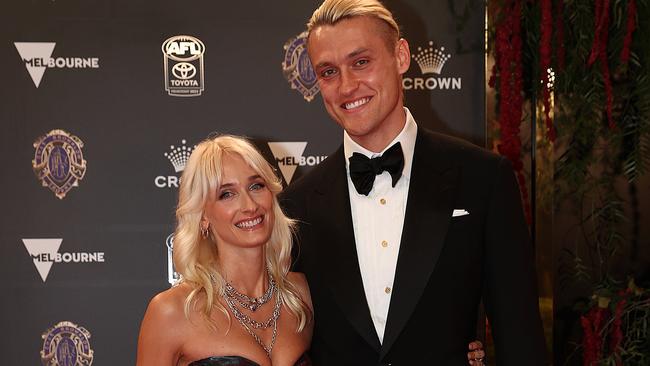 MELBOURNE, AUSTRALIA - September 24, 2023. AFL .   Brownlow medal night at the Crown Casino in Melbourne.    . Australia.. Collingwood player Darcy Moore and Dee Salmin.  Photo by Michael Klein.