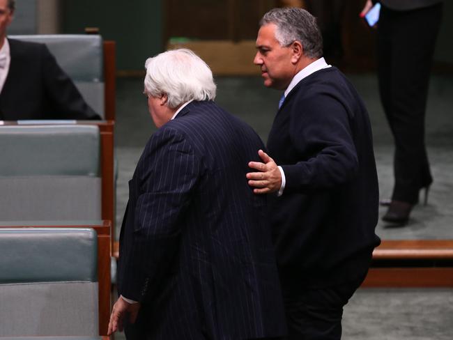 Together at last: Clive Palmer and Treasurer Joe Hockey in the House of Representatives yesterday. Photo: Kym Smith.