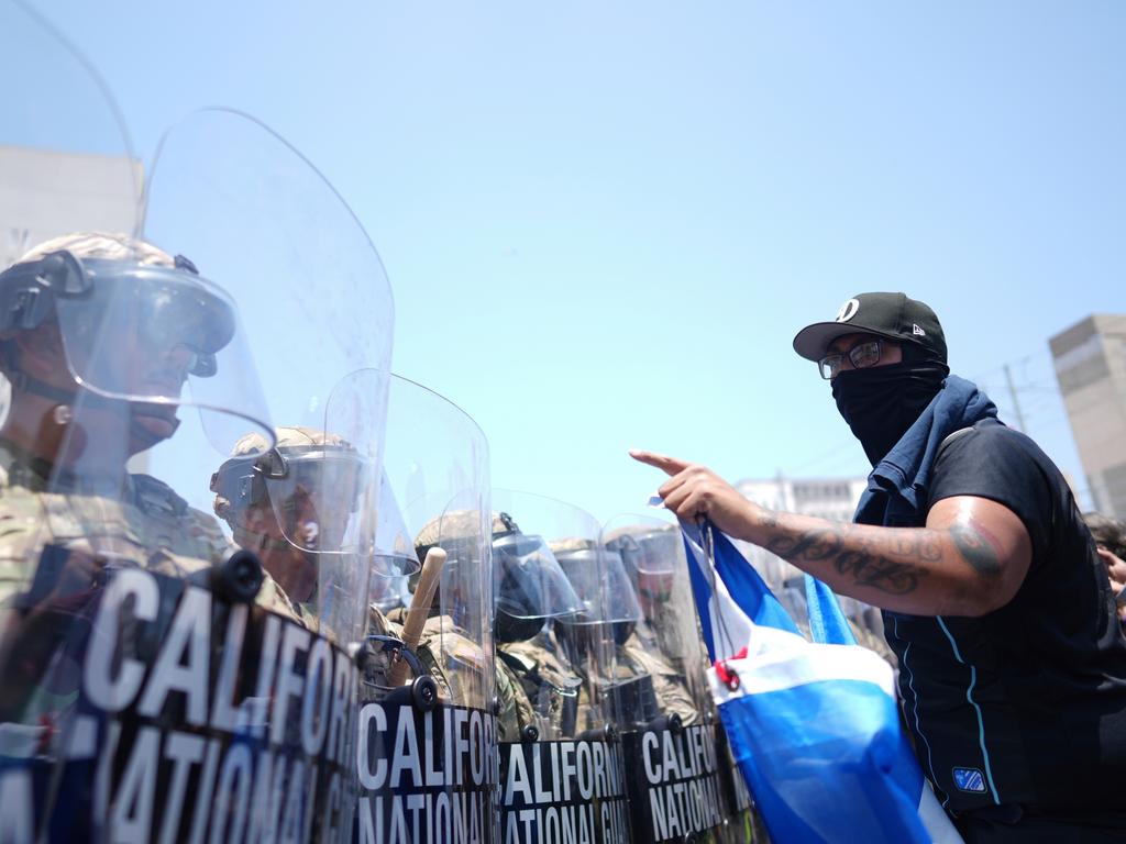 A protester confronts a line of US National Guard troops in Los Angeles. Picture: AP