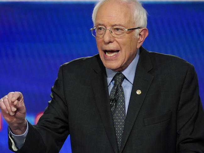 In this Sunday, March 15, 2020, photo, Sen. Bernie Sanders, I-Vt., with former Vice President Joe Biden, speaks during a Democratic presidential primary debate at CNN Studios in Washington. What might be the final showdown between the two very different Democratic candidates takes place Tuesday, March 17, 2020, during Florida's presidential primary. (AP Photo/Evan Vucci)