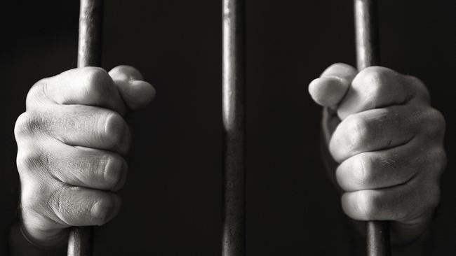 Prison Bars, Prison, Prisoner, Black And White, Black Background ,Caucasian Appearance,Close-Up, Dark, Females, Gripping, Horizontal, Human Body Part, Illuminated, Interlocked, Knuckle, Nero - Roman Emperor, Part Of, Photography, Studio, Studio Shot, Young Adult, thinkstock, generic, jail, depression, anger, trapped