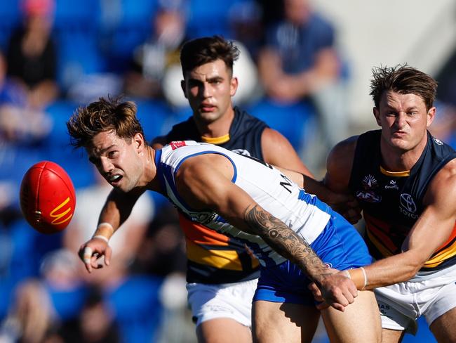 Jy Simpkin battles for possession on Saturday. Picture: Dylan Burns/AFL Photos via Getty Images