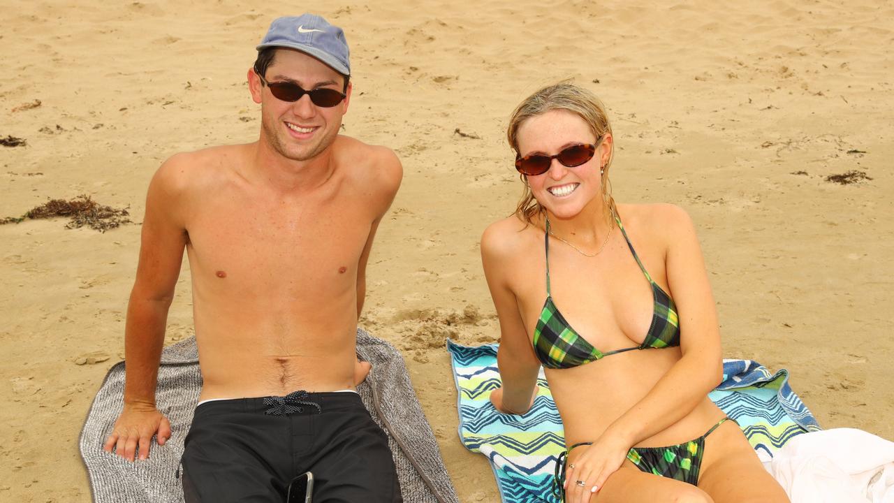 Connor O'Sullivan and Tess Russell of Geelong enjoying Boxing Day 2024 at Fishos Beach Torquay Picture: Alison Wynd