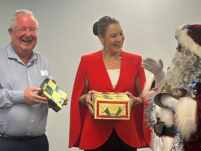 Steve Cooper, Helen Blackburn and Santa Claus gather to discuss Bundaberg's 2024 Christmas Program