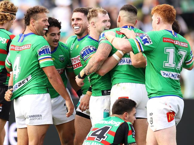 DUBBO, AUSTRALIA - MAY 22:  Xavier Savage of the Raiders celebrates with his team mates after scoring a try during the round 11 NRL match between the South Sydney Rabbitohs and the Canberra Raiders at APEX Oval, on May 22, 2022, in Dubbo, Australia. (Photo by Mark Kolbe/Getty Images)