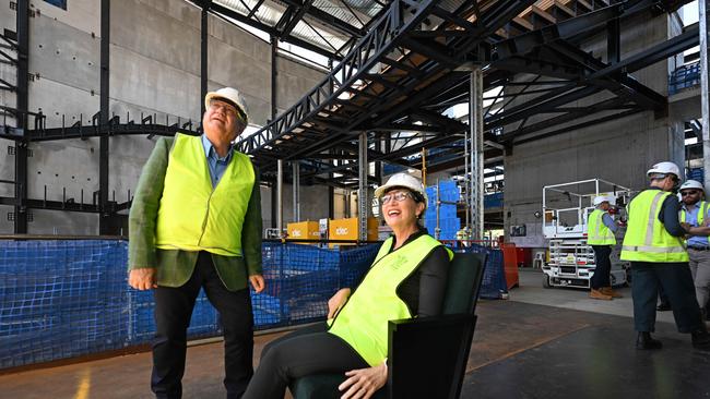 Arts Minister Leeanne Enoch testing the new seats with QPAC chief executive John Kotzas. Picture: Lyndon Mechielsen